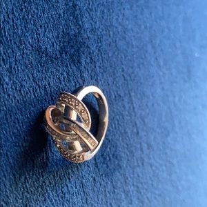 14K white gold and diamond ring.